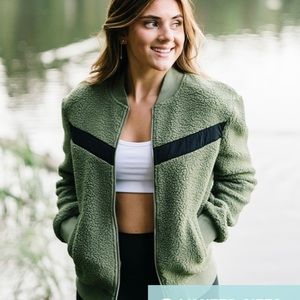 Olive Flying V Fleece Jacket.